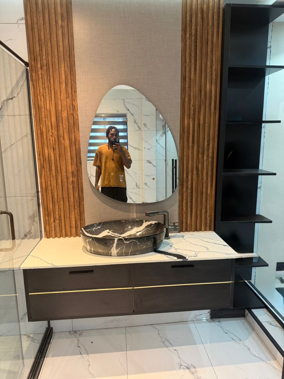 Designer bathroom vanity installation by Holiness Plumbing & Construction