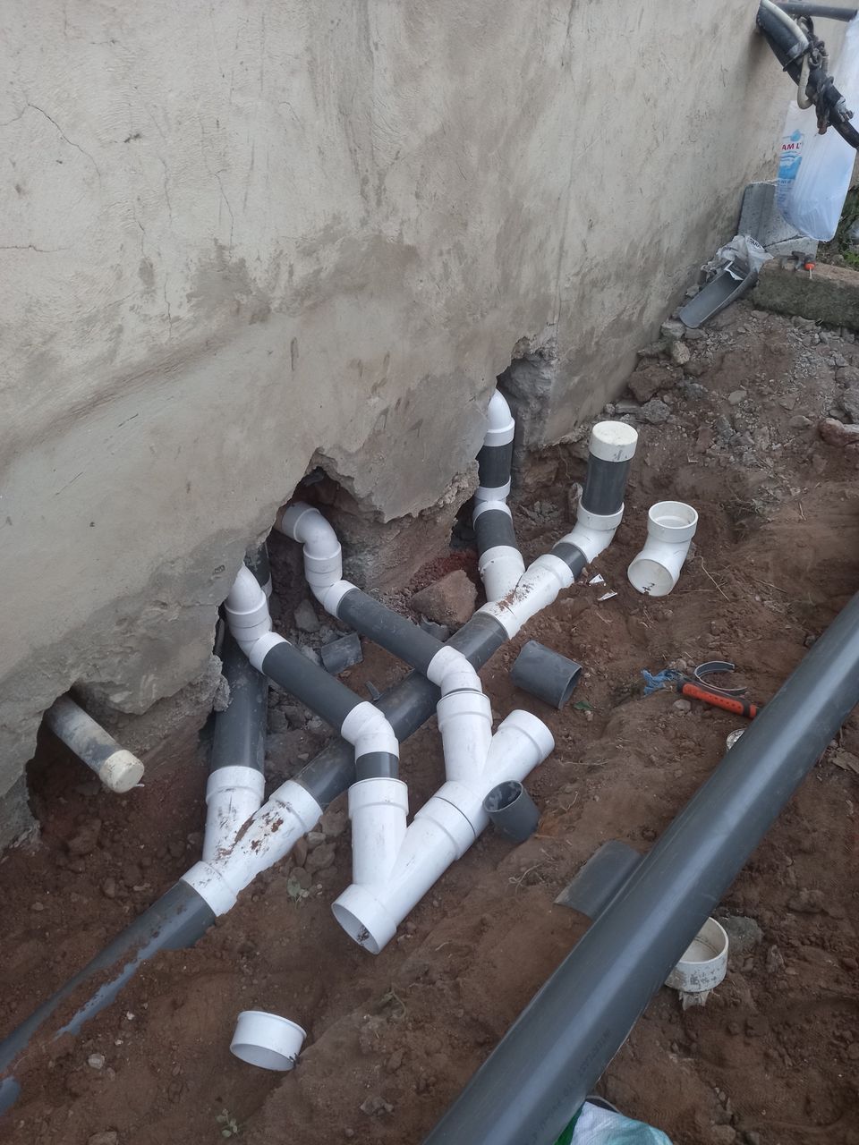 Underground drainage plumbing installation by Holiness Plumbing & Construction