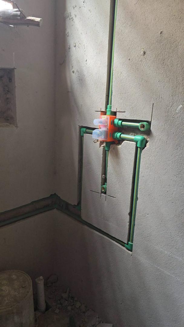 Concealed shower rough-in plumbing installation by Holiness Plumbing & Construction